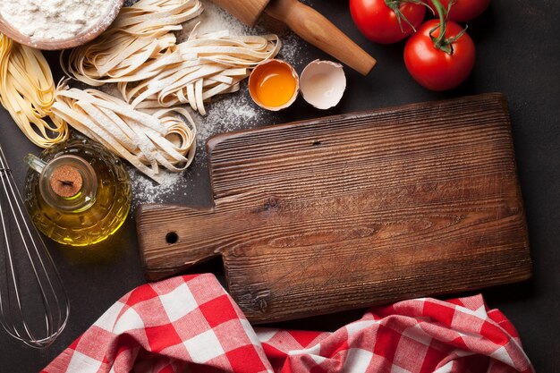 homemade pasta on wooden board
